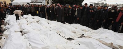 Funeral for victims of the Maghazi massacre. An Israeli airstrike targeted four houses in the Maghazi refugee camp, central Gaza on 24 December. At least 70 people were killed. Scores more were injured.