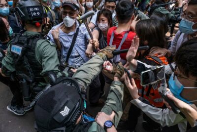 Protesters vs. police in Hong Kong in May.Credit