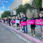 UAWD Steering Committee member Vail Kohnert-Yount (Local 2320) joins other activits in rallying for reproductive justice in Brownsville, Texas.