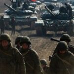 Russian tanks, troops along border with Ukraine